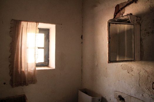 Remains of toilet of abandoned building of the gold mines of Rodalquilar village in Almeria province, Andalusia community, Spain.