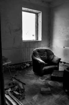 Abandoned house with broken furniture in the gold mines of Rodalquilar village in Almeria province, Spain.