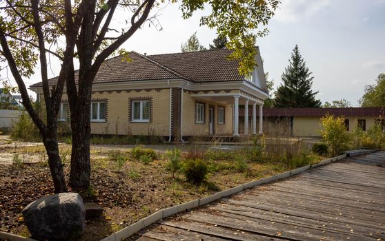 Dacha, a house for seasonal living, located in a rural area. Designed for family holidays and growing fruits and vegetables.