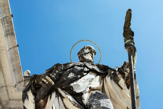 Montecassino Abbey -Italy - August 29-2021 -statue of St. Benedict against blue sky  , Benedictine monastery 