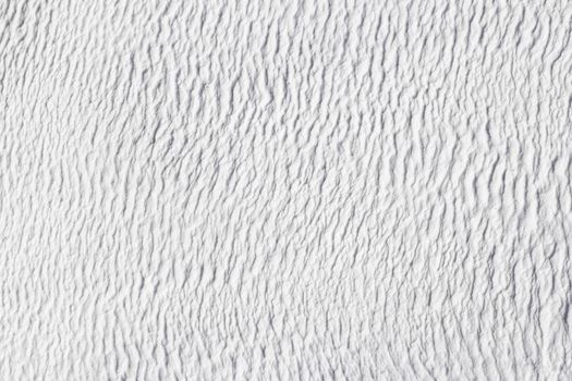 Gray texture of abstract background of Pamukkale calcium travertine in Turkey.