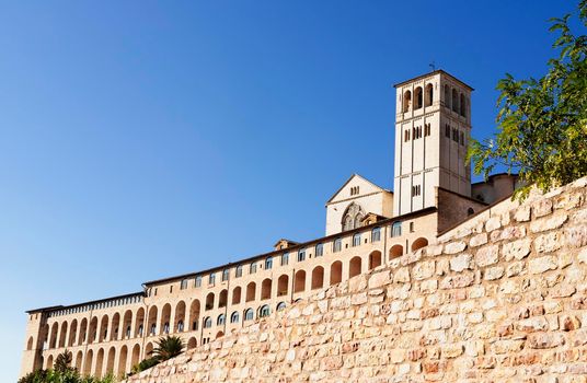 The friary Sacro Convento in Assisi with impressive arches and buttresses next the Basilica of Saint Francis 