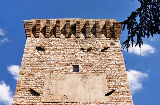 Tower of Federico Barbarossa fortress near Porta dell'Arce the upper part of Spello one of the most beautiful village of Italy