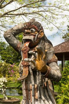 Closeup of traditional Balinese God statue in Central Bali temple