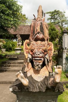 Closeup of traditional Balinese God statue in Central Bali temple