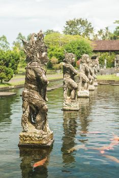 Tirtagangga water palace with fountains and ponds on Bali, Indonesia