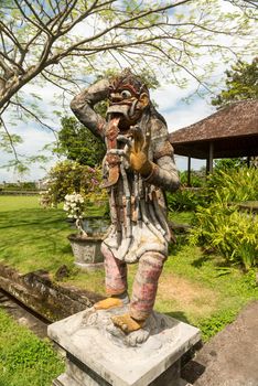 Closeup of traditional Balinese God statue in Central Bali temple