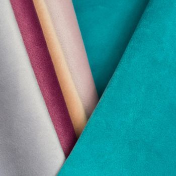 Velvet fabric abstract colorful background macro shot