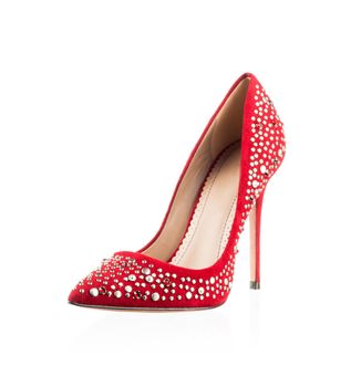 Modern fashionable women red shoe shot in studio