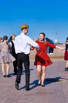 St. Petersburg, Russia - May 09, 2021: Couples dancing on Victory Day on St. Petersburg Square