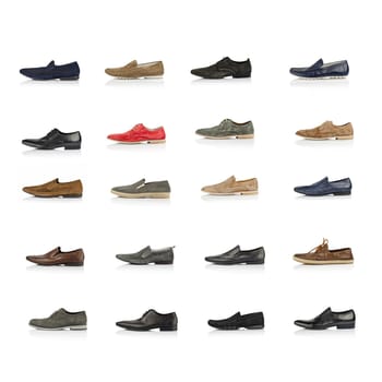 Large collection of male shoes over white background