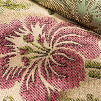 Fabric background with floral pattern macro shot