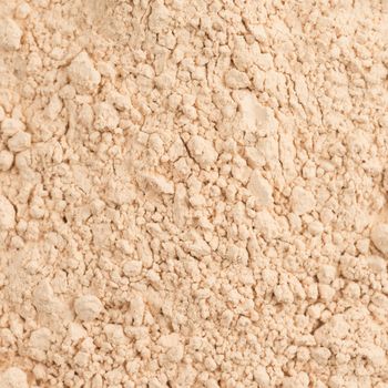 Cosmetic powder crushed square closeup macro shot