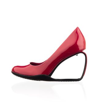 Modern fashionable women red shoe shot in studio