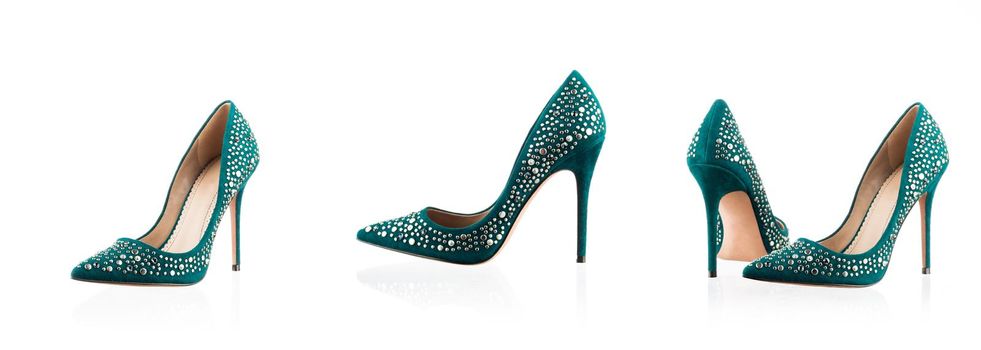 High heel green woman shoes isolated on white
