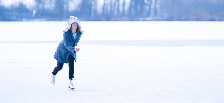 ice skating on a frozen pond in winter.