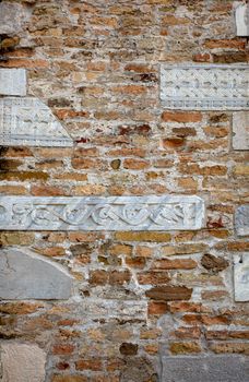 Frieze on the Basilica wall of Santa Maria Assunta, Aquileia, Italy