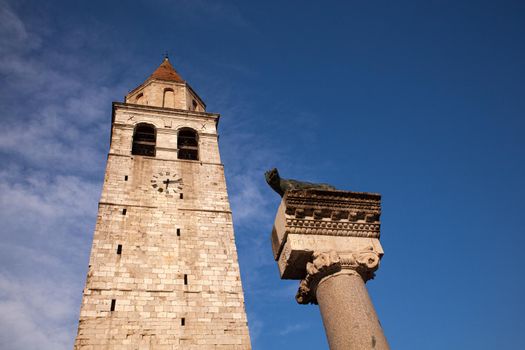 View of the Capitoline Wolf under the Bell tower of the Basilica di Santa Maria Assunta, Aquileia