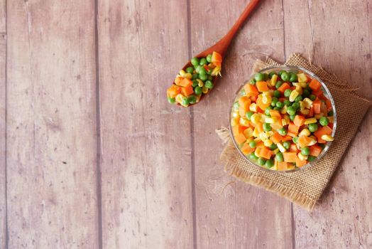 corn, carrot and beans in a bowl on table ,