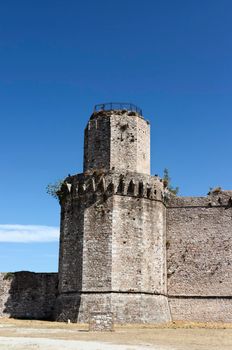 Assisi, Italy , polygonal tower of Rocca Maggiore fortress reconstructed in 1356, medieval military architecture