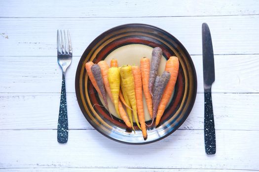colorful fresh carrot on blue background ,