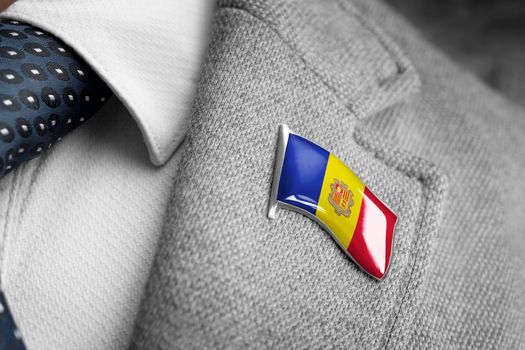 Metal badge with the flag of Andorra on a suit lapel.