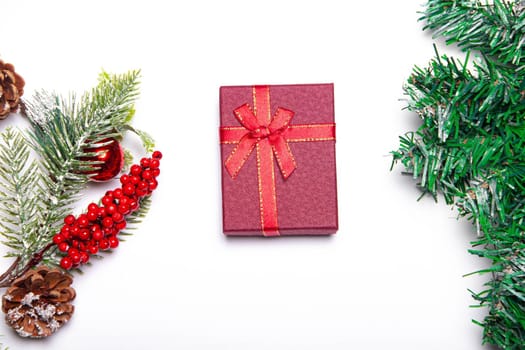 The gift box is red on a white background . New Year and Christmas, birthday. Gift. White background. Copy Space