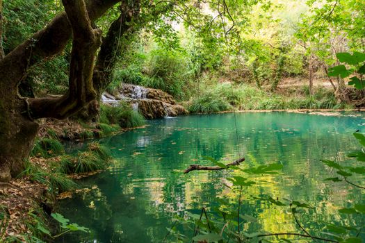 Mountain waterfall and lake view at polilimnio, Messinia, Greece