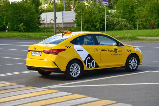 Moscow, Russia - June 1. 2021. Yandex Go taxi company car on road