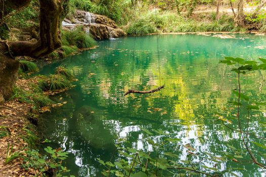 Mountain waterfall and lake view at polilimnio, Messinia, Greece