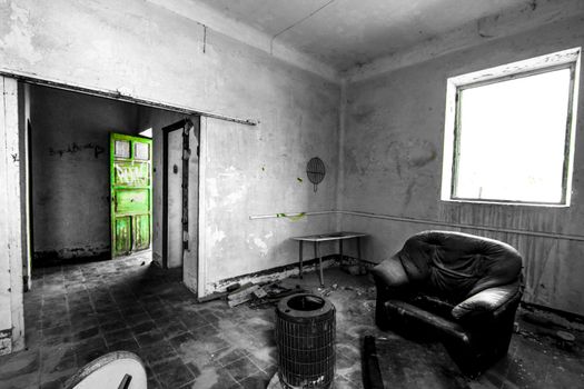 Abandoned house with broken furniture in the gold mines of Rodalquilar village in Almeria province, Spain.