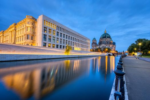 The Berlin Cathedral, the river Spree and the modern backside of the City Palace at dawn