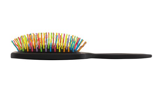 new rainbow colorful pastic hair brush isolated on white background. side view