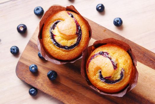 blueberry muffins on table with copy space .