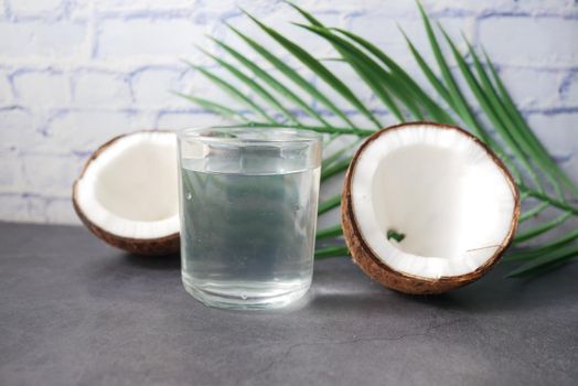 slice of fresh coconut on a table cloth .