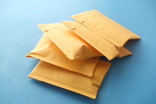 yellow paper bubble envelope on table ,