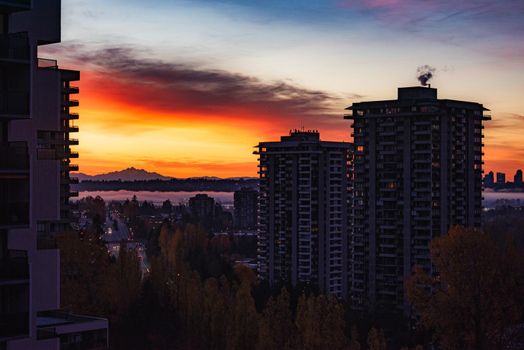 Early morning in a city. Dawn coming from the East.