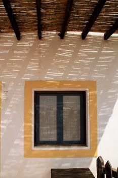 Whitewashed houses with wooden windows and doors in Rodalquilar, Andalusia, Spain