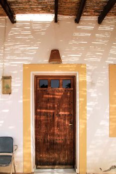 Whitewashed houses with wooden windows and doors in Rodalquilar, Andalusia, Spain