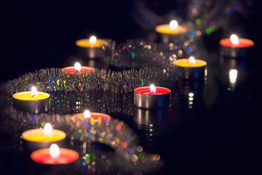 christmas candles close up on dark background