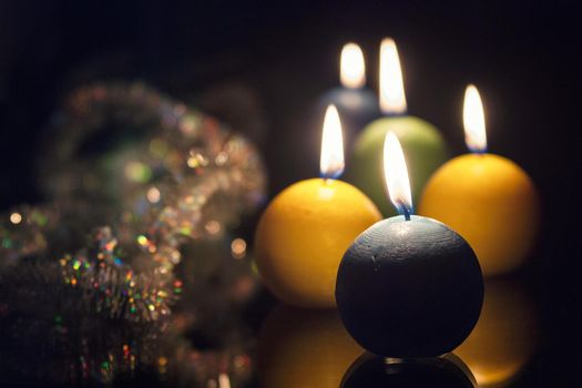 christmas candles close up on dark background