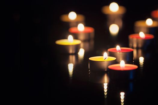 christmas candles close up on dark background