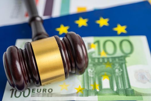 EU flag with gavel and Euro banknote for judge lawyer. Law and justice court concept.