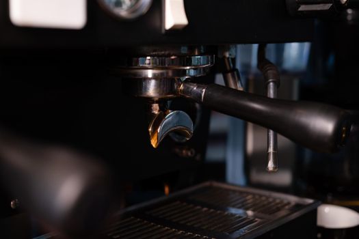 details of dark loft coffee shop. professional coffee machine close up.