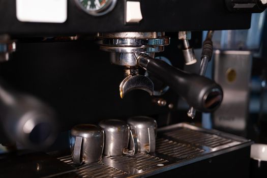 details of dark loft coffee shop. professional coffee machine close up.