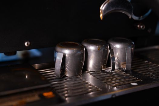 details of dark loft coffee shop. professional coffee machine close up.