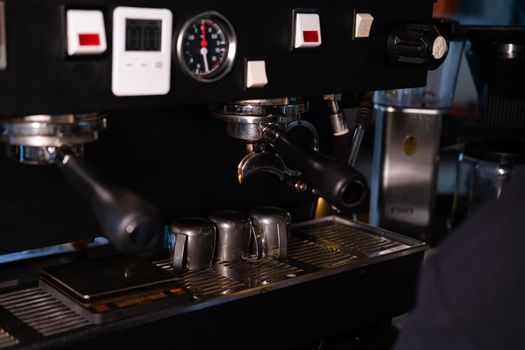 details of dark loft coffee shop. professional coffee machine close up.