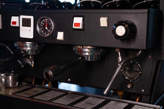 details of dark loft coffee shop. professional coffee machine close up.