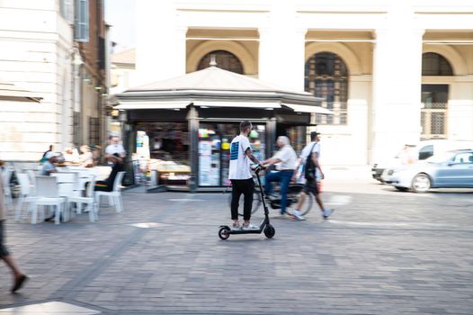 terni,italy september 29 2021:panning of a scooter in the city of terni