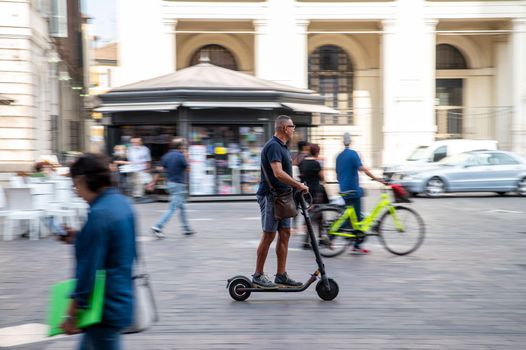 terni,italy september 29 2021:panning of a scooter in the city of terni